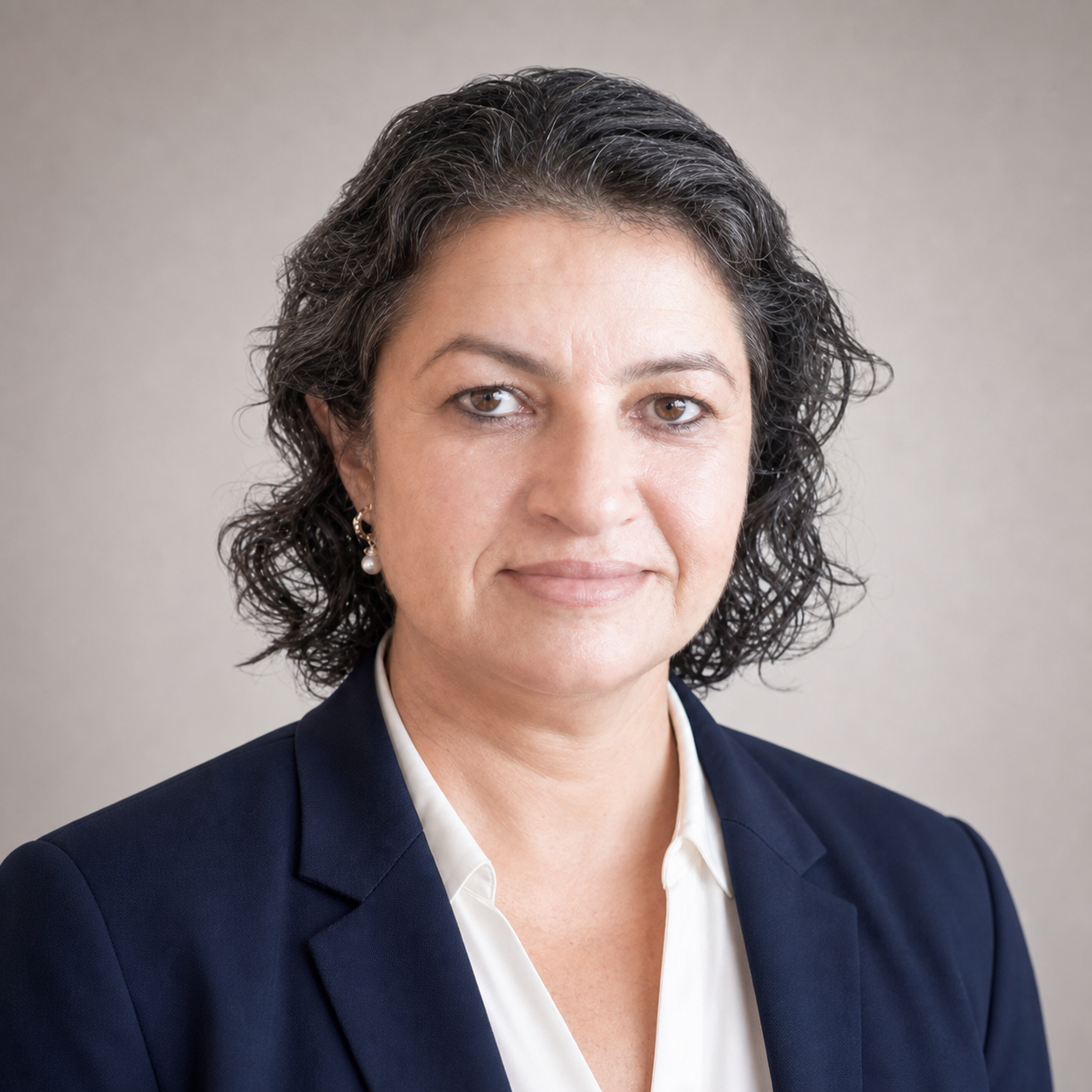 Portrait of Sheena Chopra, CEO of AIONSITE
